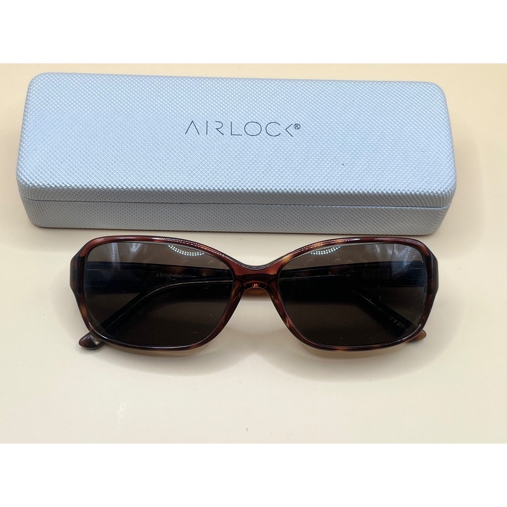 Anne Klein AK7031 206 Mocha Tortoise Sunglasses Silver Lion Logo Case